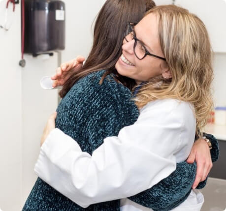doctor hugging patient