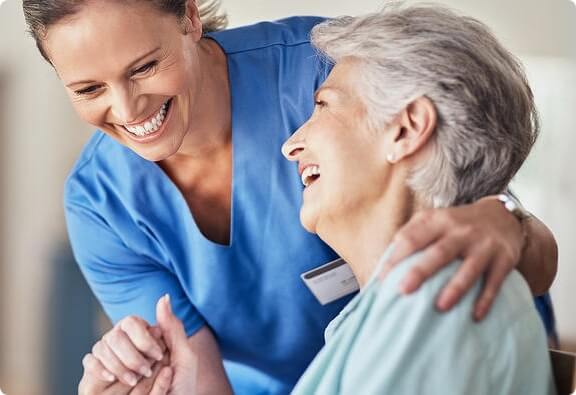 nurse caring for elderly patient
